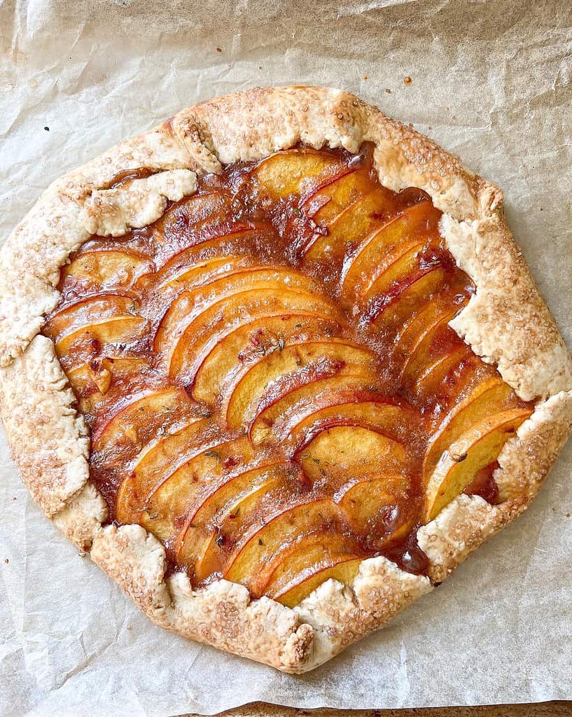 A rustic galette is filled with summertime peaches.