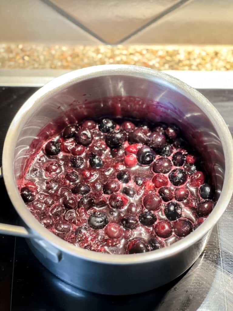 Blueberries after cooking for an hour in a large pot.