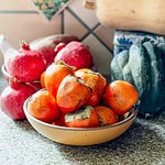 Portrait photo of ripe hachiya persimmons for Persimmon Butter.