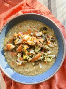 Portrait shot of this yummy plant based broccoli soup that is blended with cauliflower and white beans.