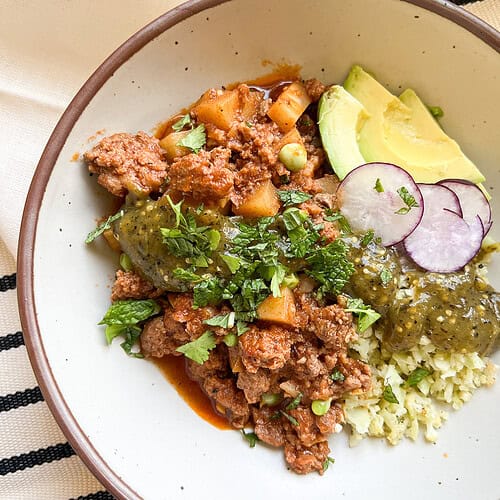 Closeup photo of Grandma's Picadillo Recipe featuring ground lamb and veggies.