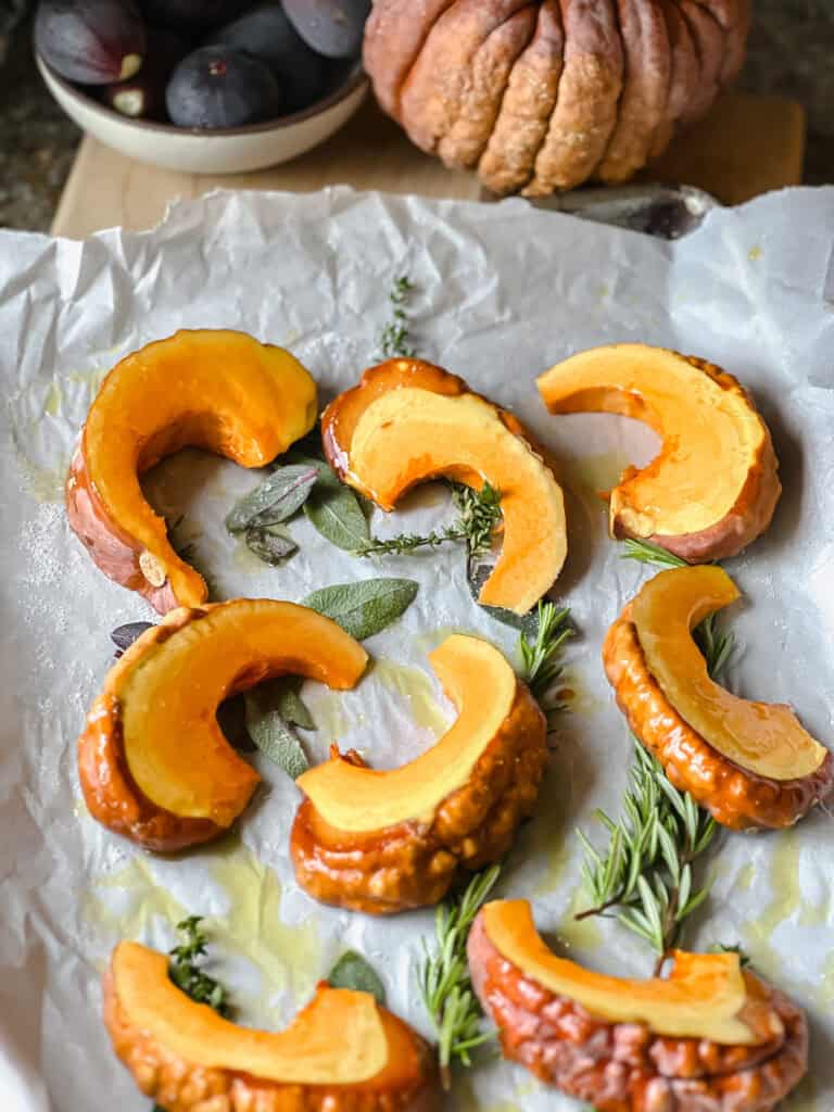 Portrait of sliced heirloom squash before roasting. 