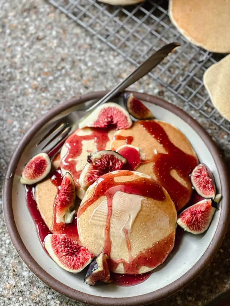 Fresh buttermilk pancakes topped with fresh figs and the fig syrup recipe.